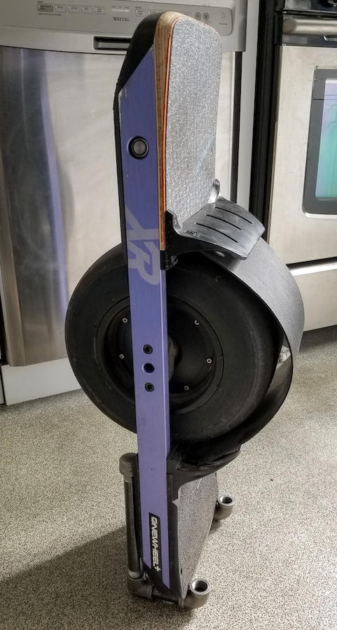 onewheel in pipe stand